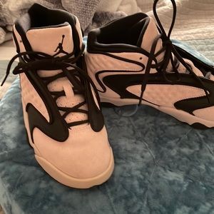 Jordan pink suede with black accents.  Size 8.5